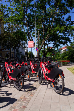 Bike-sharing station for red MEVO shared bicycles and electric bikes manufactured by Segway, convenient and sustainable urban transportation on July 24, 2026 in Sopot, Poland.