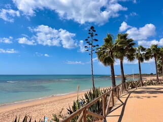 promenade with palms in Zahora at the Playa de Zahora, beach at the Atlantic Ocean, Andalusia, Costa de la Luz, Spain © keBu.Medien