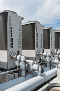 Vertical View of Rooftop Air Conditioners and HVAC Piping System