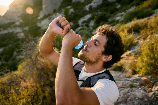 Trail Runner Drinking Water
