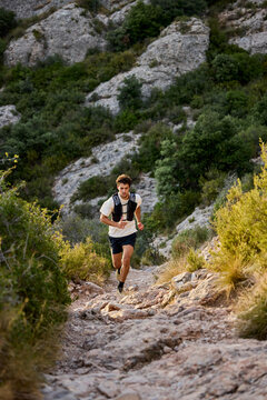 Trail Runner on Rocky Mountain Path