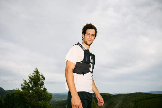 Trail Runner Looking at Camera With Flash