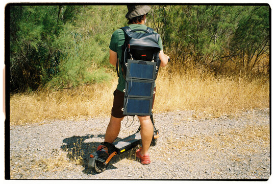 Solar Backpack Scooter Ride