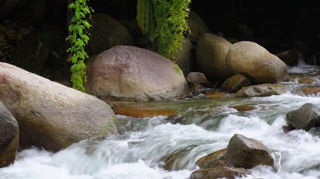 White Water Rapids Around Granite Boulders