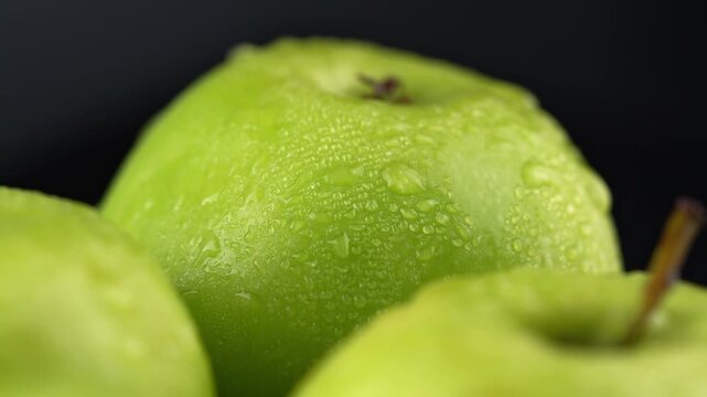 Fresh Green Apples with Water Droplets CloseUp video.