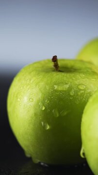 Fresh Green Apples with Water Droplets CloseUp video.