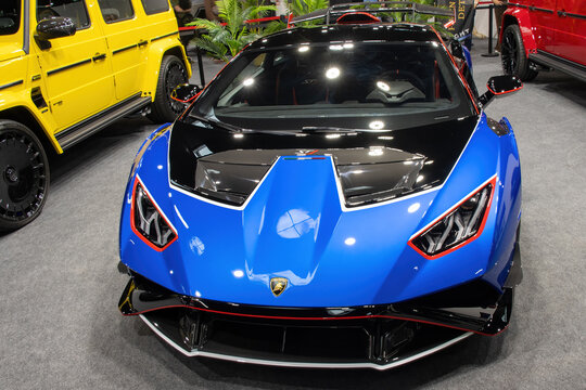 Lamborghini Huracan sports car displayed at a motor show.