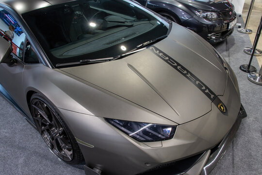 Lamborghini Huracan sports car displayed at a motor show.