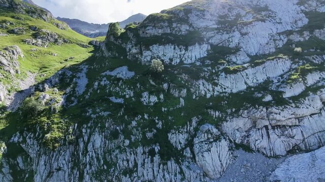 High angle view of rugged alpine rock formation and stone layers texture