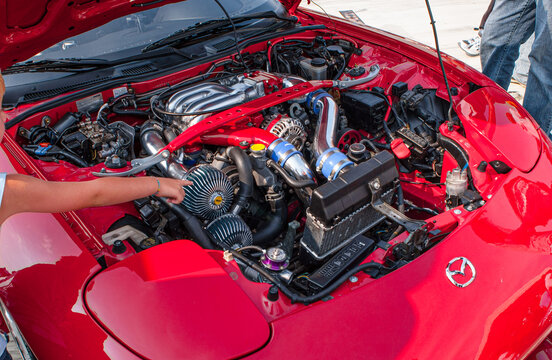 Kristiansand, Norway - August 20 2005: Modified Mazda RX7 engine bay with polished performance components.