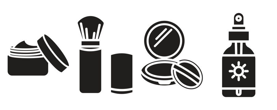 Cosmetic products arranged in a line during a studio setting with a clean white background for beauty advertising