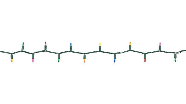 Festive string of multicolored Christmas lights isolated on a clean white background for decor