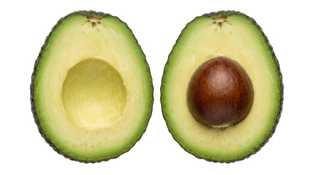 Two halves of a ripe avocado showing the green flesh and the large brown seed on white background