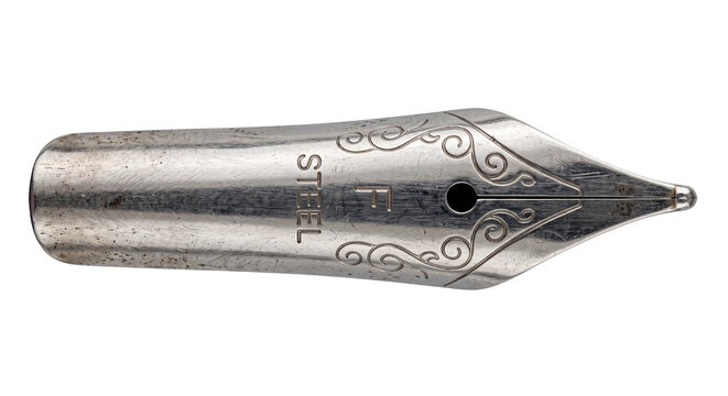 Close up of a vintage metal fountain pen nib with ornate engraving isolated on white background