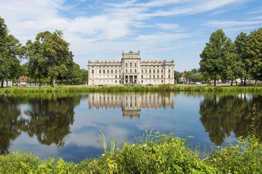 Ludwigslust Castle with pond and water reflection, Ludwigslust, Mecklenburg-Western Pomerania, Germany