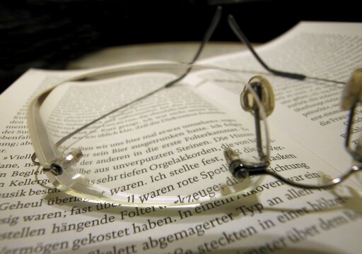 Glasses and book