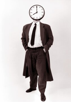 Man with clock instead of his head