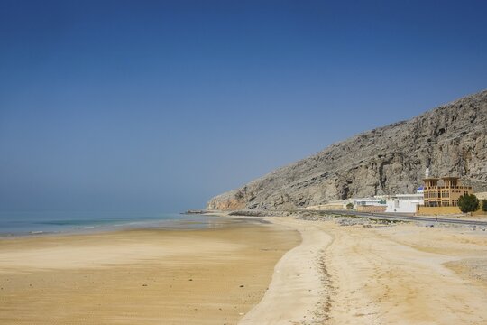 Long sandy beach along the Khasab coastal road, Musandam, Oman