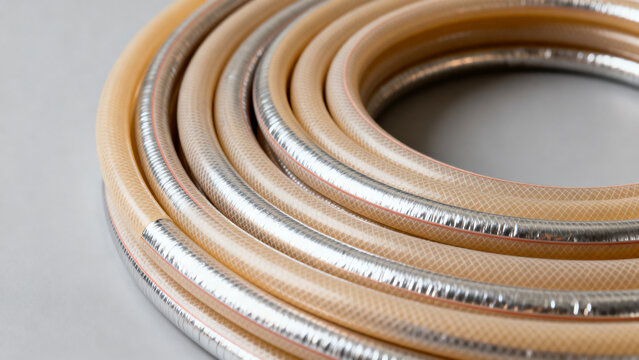 Coiled multilayer plastic aluminum pipes and flexible polyethylene tubing designed for reliable water distribution, underfloor heating, plumbing systems, irrigation networks, and modern construction p
