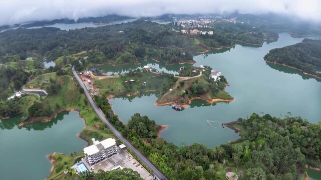 Guatap&eacute; Reservoir with Scenic Islands and Green Mountain Landscape in Antioquia, Colombia. Time Lapse. Establishing Shot. Aerial View.