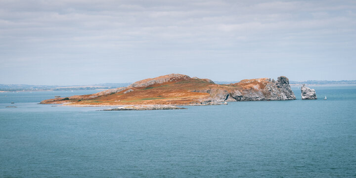 Coastal landscape with island formation and cliffs in Howth Ireland