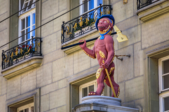 Historic Affe monkey guild statue with an axe on Kramgasse in Bern, Switzerland