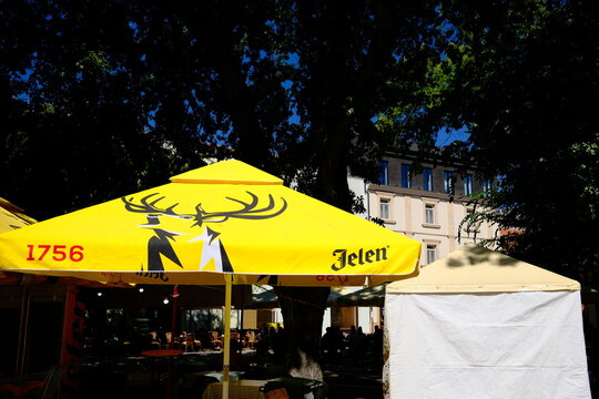 Subotica, Serbia &ndash; September 6, 2026 &ndash; Jelen beer brand sign on an umbrella at a summer caf&eacute;