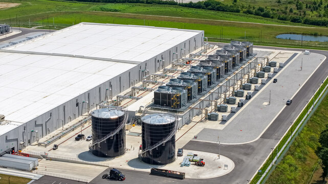 Data center infrastructure with cooling towers and water tanks