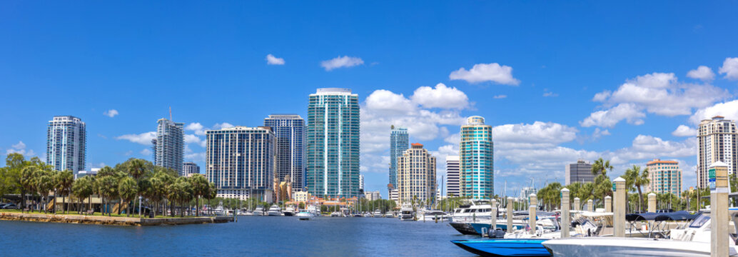 Wide panoramic aerial view of the Saint Petersburg Florida skyline and waterfront harbor with modern skyscrapers