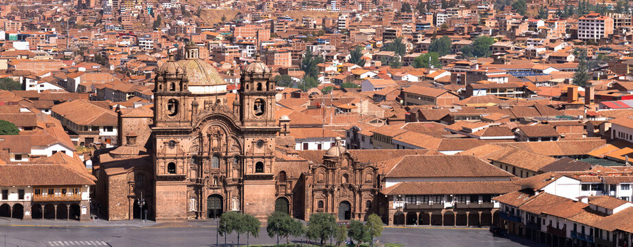 Peru, Cusco, Panorama and city landscape Plaza de Armas square in historic city center with churches, monuments and restaurants