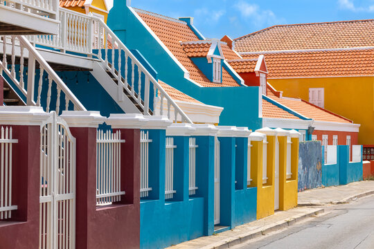 Vibrant painted building facades with shutters in the historic Pietermaai district of Willemstad Curacao