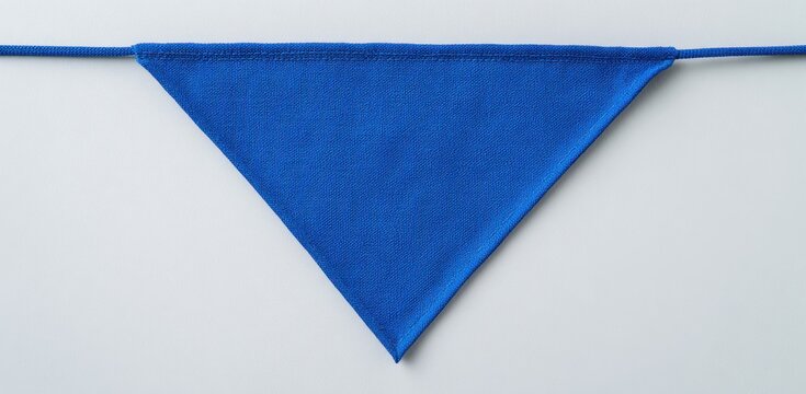 Blue textured fabric triangular pennant flag attached to a string with triangular geometric material decoration triangle celebration accessory stitched isolated background template