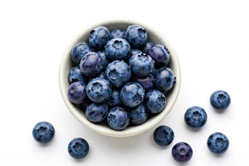 blueberries in a bowl isolated on white © DIMAS