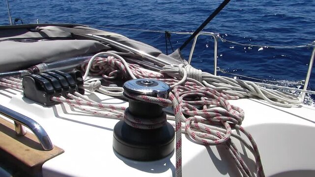 Sailing yacht deck with winch and ropes