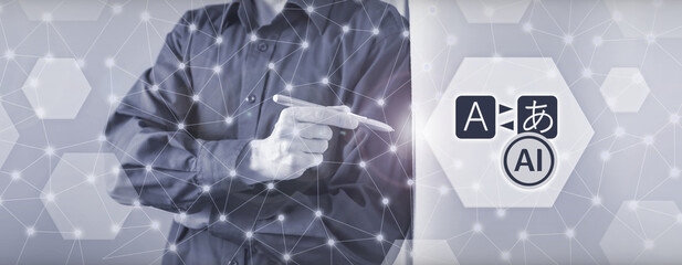 AI language translation tool powered by artificial intelligence technology. A person interacts with a futuristic digital interface showing localization symbols in a modern office. © sh99
