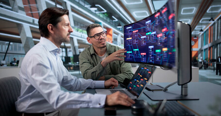 Software Developer And Colleague Review Low Code Platform Workflow