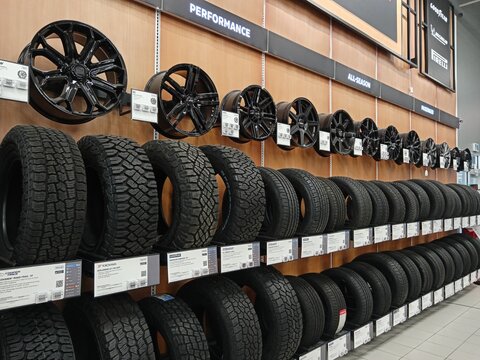 Penticton, Canada - July 19, 2026: Interior view of various tires and alloy wheels at a Canadian Tire store located in Penticton, British Columbia, Canada.