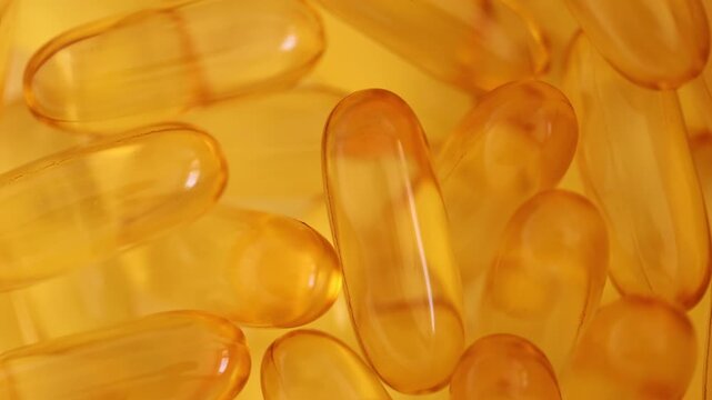 Golden omega-3 soft gel supplements for promoting health and wellbeing.	