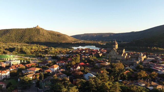 Fast Aerial Flyover of Mtskheta, Georgia, with the Aragvi and Kura River Confluence and Historic Hilltop Monastery