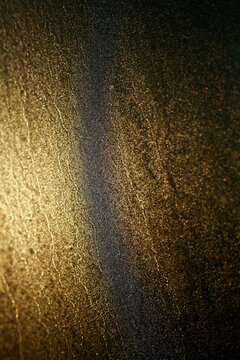 Abstract blurry golden background. Seamless texture.