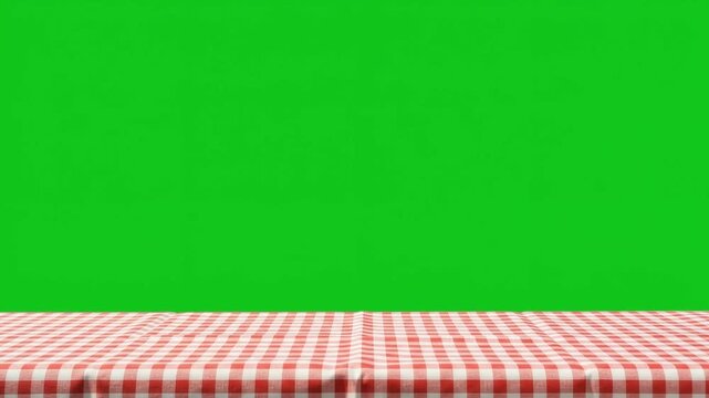 Red gingham tablecloth border fluttering on chroma key green screen