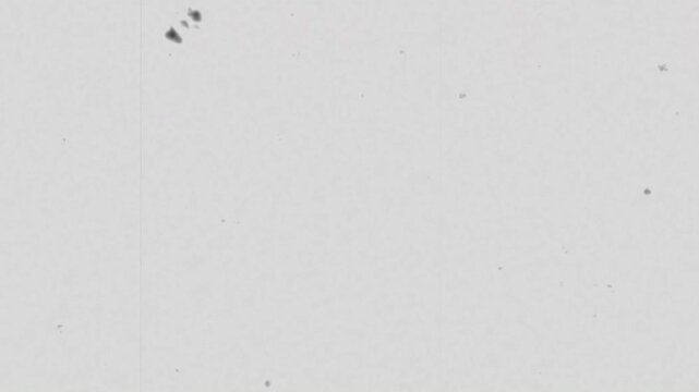 Authentic old film effect overlay with noise, grain, negative film, dusty grunge rough vintage video for screen or blending mode. 4k video retro template.