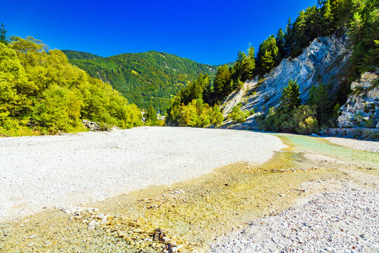 Pisnica River near Kranjska Gora, Slovenia &ndash; Clear Alpine River and Forested Julian Alps
