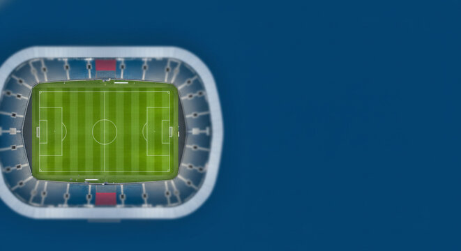 Aerial view of a modern soccer stadium with a vibrant green pitch and empty blue seating under a clear sky, perfect for sports events and game day concepts