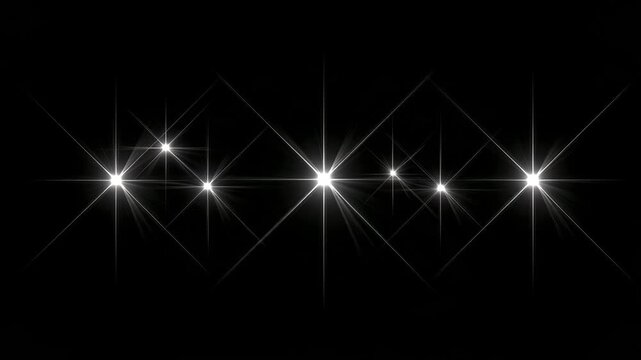 Bright white sparkling starburst lights with glowing lens flare and sharp radiant rays on a pure black background, elegant shimmering light effects for festive decoration and abstract design