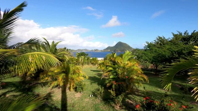 Terre-de-Haut with Le Chameau Mountain, Iles des Saintes, Guadeloupe, Lesser Antilles, Caribbean. Scenic view of Terre-de-Haut seen from Terre-de-Bas Island, Iles des Saintes, Guadeloupe, Lesser Antil