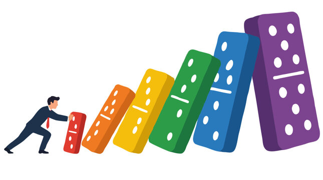 Small businessman pushing tiny domino piece triggering long chain reaction of larger colorful falling dominoes, business concept of momentum growth success leadership strategy and cause effect