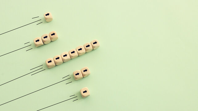 Arrows on wooden blocks, idea of thinking differently, setting goals and thinking about solution