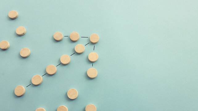 Wooden cubes forming arrow shape