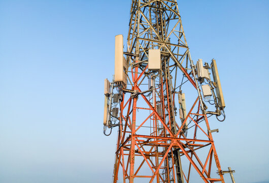 Aerial View of Telecommunication Tower with Radio Masts and Equipment in the Morning in Purwokerto, Central Java, Indonesia.